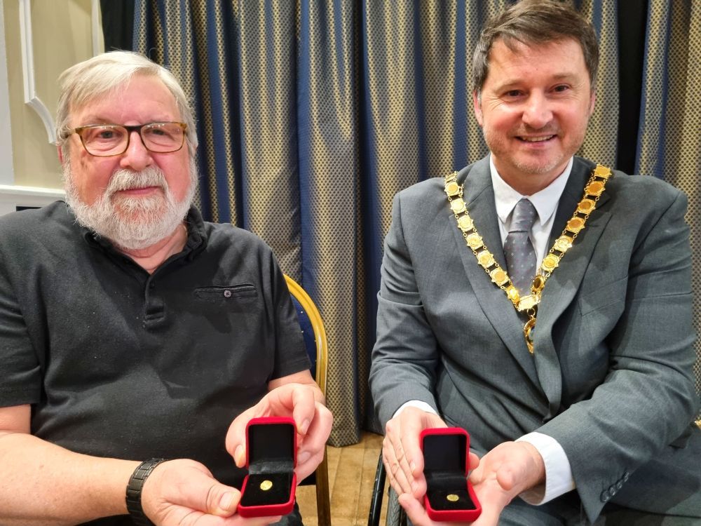 Town council presents replica tremisses to Ongar Millennium History Society  